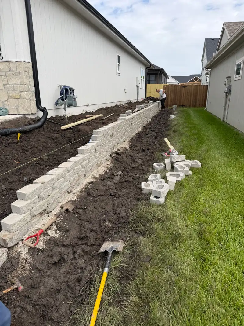 Retaining wall & grading, Lawrence — before