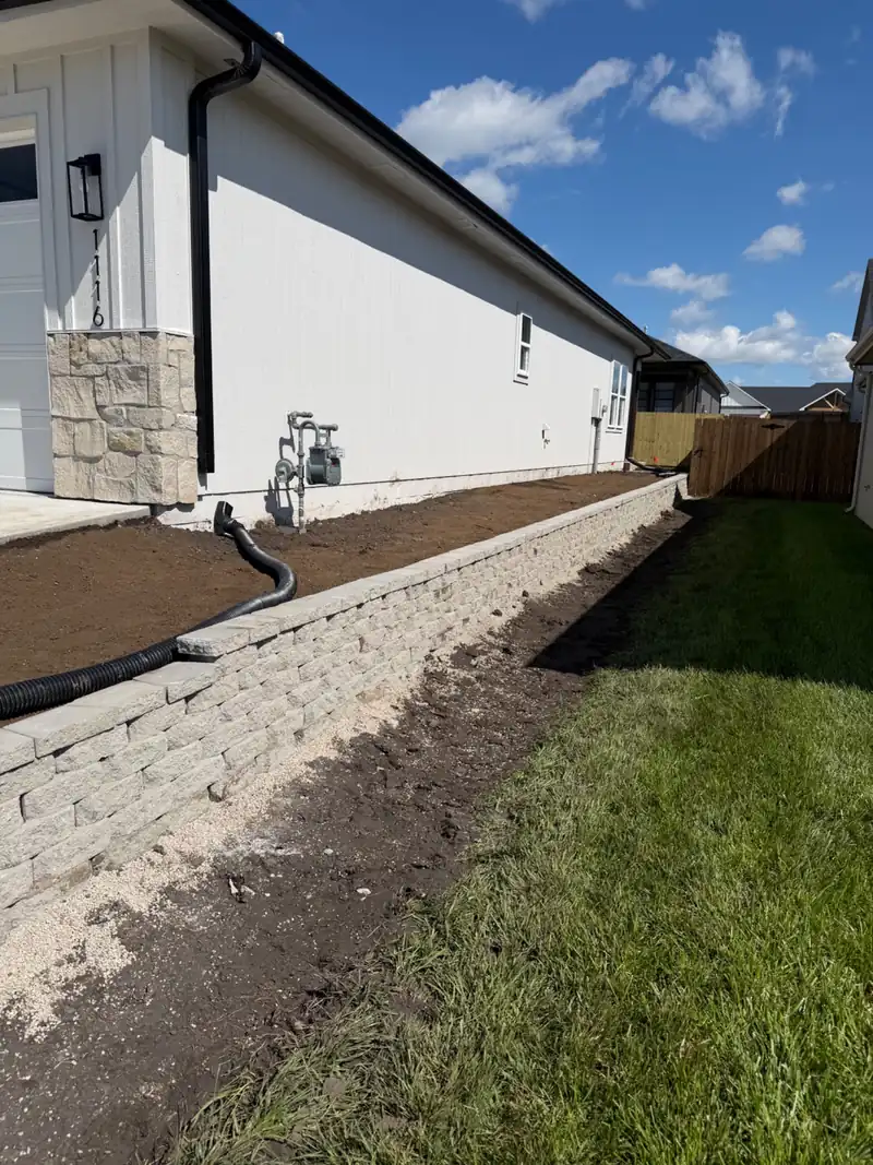 Retaining wall & grading, Lawrence — after